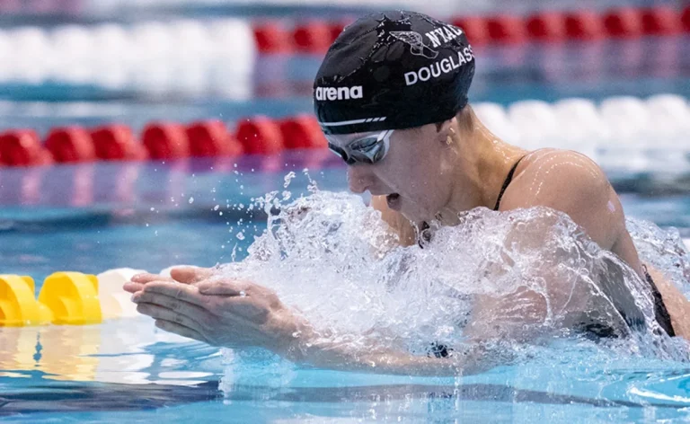 In the 200-meter breaststroke, Kate Douglass smashes the US record