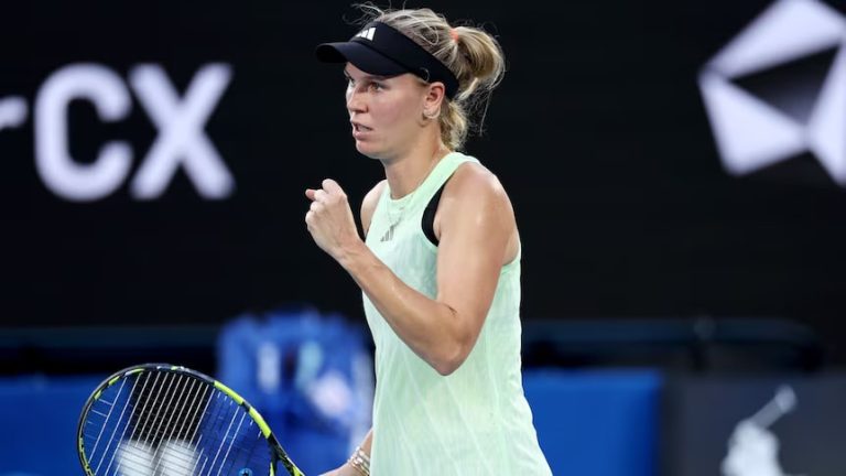 Wozniacki claimed her first Aus Open title in four years as her opponent withdrew from the match