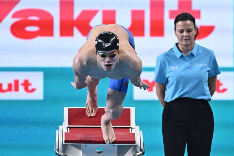 Pan Zhanle, the world record holder, wins gold in the 100m freestyle at Doha