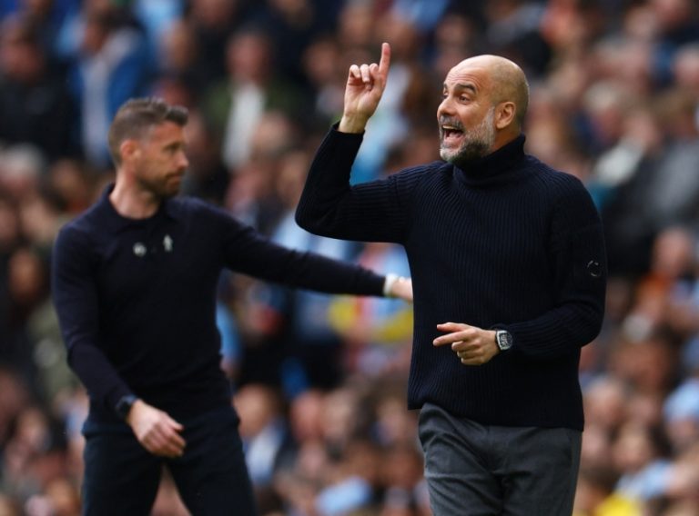 Guardiola Cautions Against Premature Dreams as Manchester City Chase Historic Treble